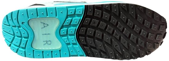 Onderkant van een zwarte en blauwe Nike Air Max sneaker met een luchtdempingsunit.