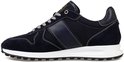 Donkerblauwe PME Legend sneaker met witte stiksels, grijs met witte veters en een witte zool.