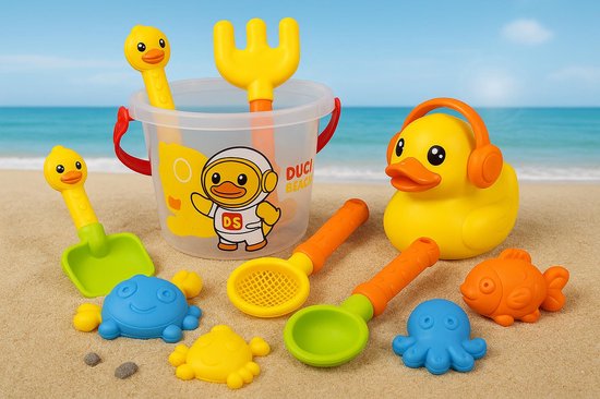 Beach toys on sand: yellow duck with headphones, bucket with duck, shovel, rake, sieve, molds (duck, starfish, octopus, fish).