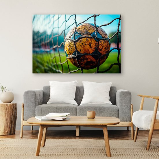 Canvas Schilderij Mensen spelen hockey op een groen veld - 90x60 cm