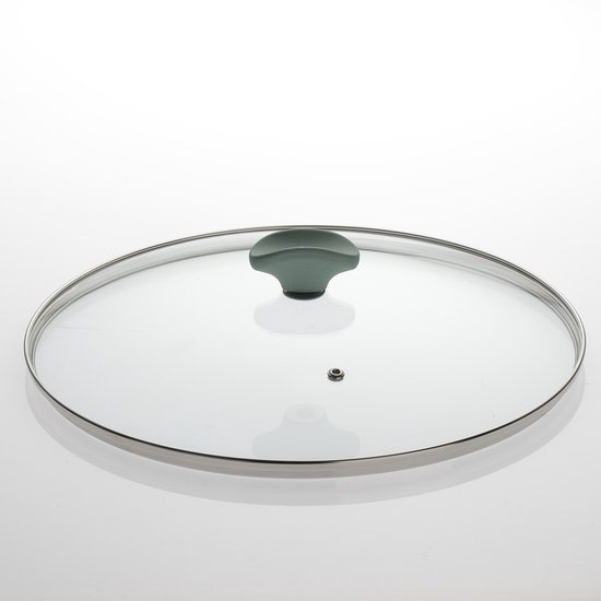 Glazen deksel voor een pan met een lichtgroen handvat.