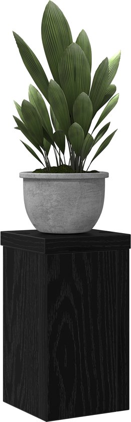 Zwarte plantenstandaard met eikennerfstructuur, met een groene plant in een grijze pot.