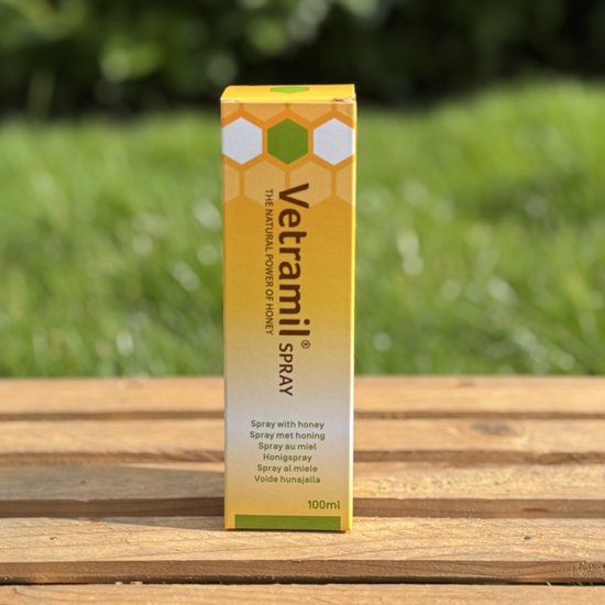 Vetramil SPRAY met honing, 100 ml. Geel met honingraatmotief.
