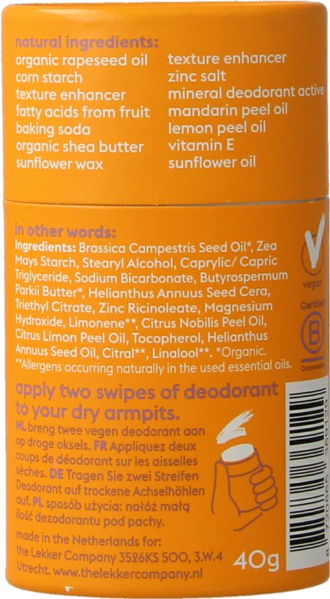 Achterkant van oranje deodorant container met ingrediënten en instructies.