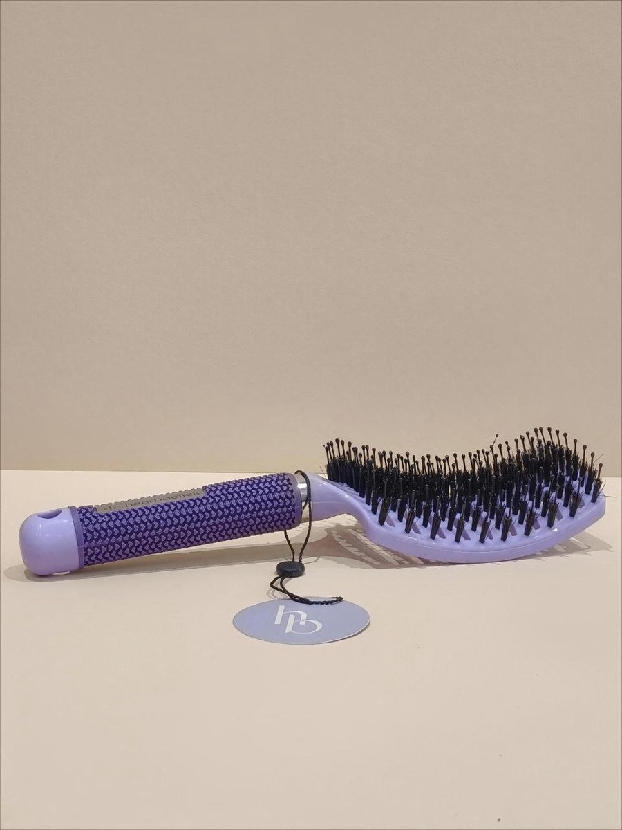 De haarboetiek haar borstel paars