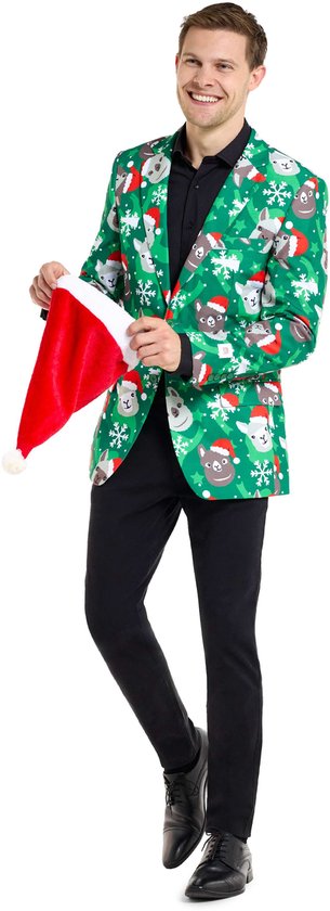Man met een groen kerstcolbert met lama's, toont kerstmuts
