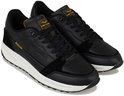 Zwarte leren sneakers met suède details, witte zool en 'PME' op de hiel.