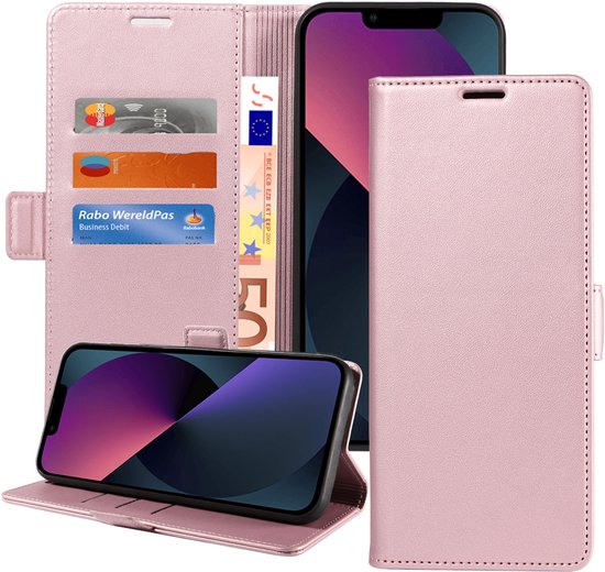 Étui portefeuille rose ouvert avec téléphone, cartes de crédit et billets.