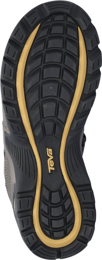 Zool van grijze Teva sandalen met "Teva" logo en geel accent.