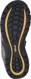 Zool van grijze Teva sandalen met "Teva" logo en geel accent.