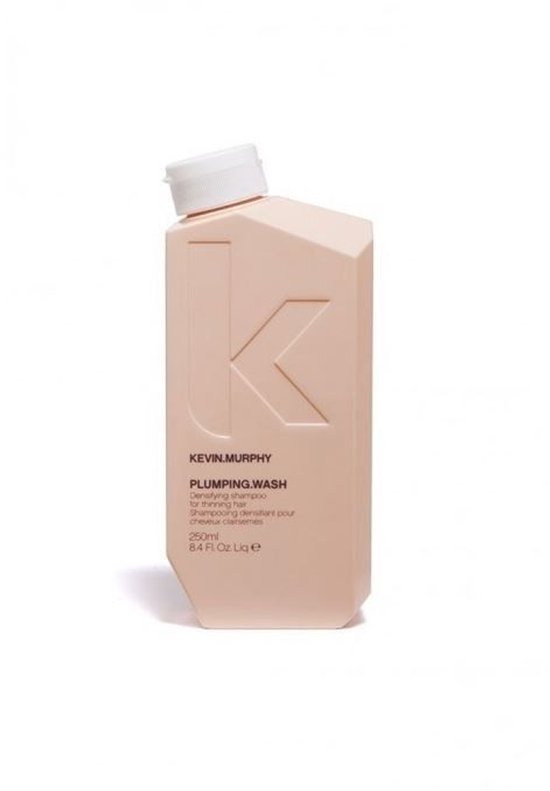 Perzikkleurige fles KEVIN.MURPHY PLUMPING.WASH shampoo, 250 ml.