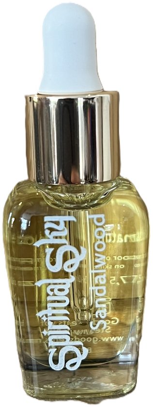 Glazen flesje met gouden dop en witte druppelaar, gevuld met gouden olie. Flesje met 'Spiritual Sky Sandalwood' logo.