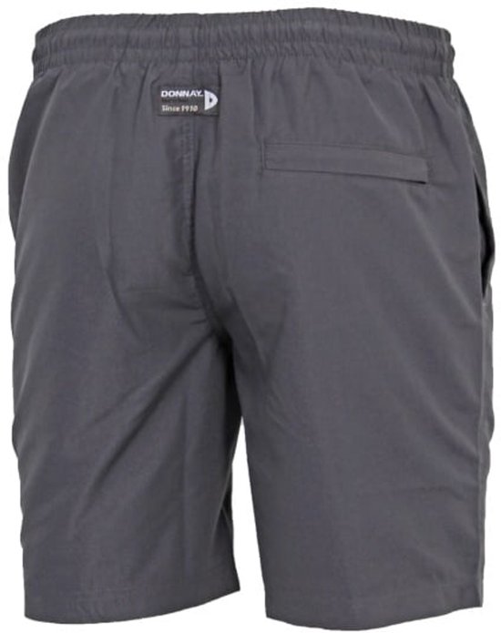 Achterkant van een donkergrijze Donnay sportbroek met elastische tailleband en een zak.