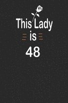 This lady is 48: funny and cute blank lined journal Notebook, Diary, planner Happy 48th fourty-eigth Birthday Gift for fourty eight yea