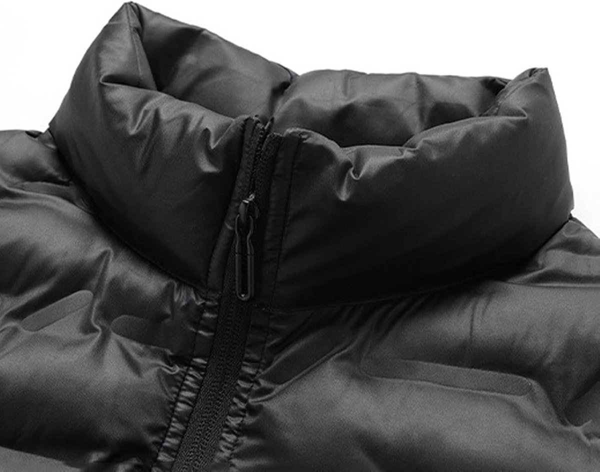 Ademend wintervest biedt extra warmte en comfort, ideaal voor laagjes. Oversize mouwloze jas voor koud weer.