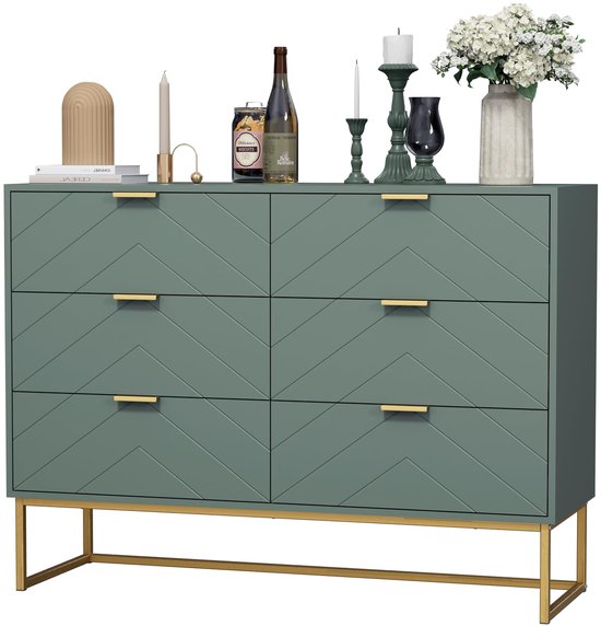 Groen dressoir met 6 lades, visgraatpatroon en gouden poten, met decoratie.