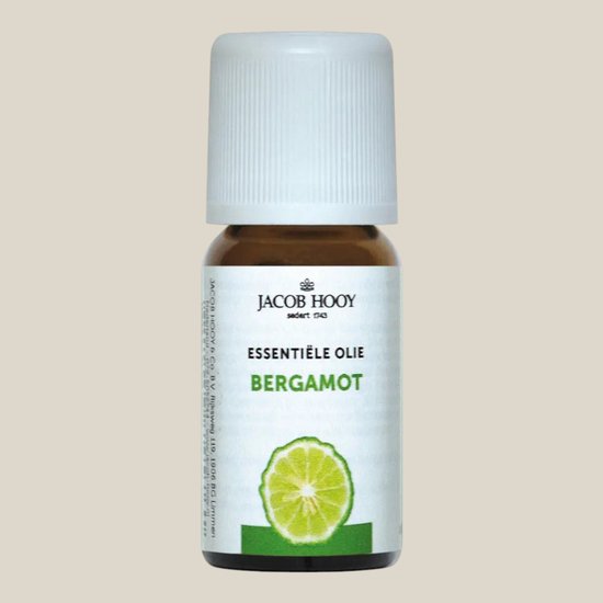 Jacob Hooy Essentiële Olie Bergamot flesje met witte dop en een afbeelding van een bergamotplak.