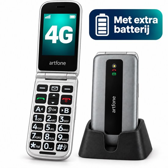 Artfone F30 4G senioren telefoon in zilverkleur, opengeklapt en gesloten in een oplader. Met tekst 'Met extra batterij'.