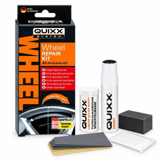 Kit de réparation QUIXX pour jantes : une boîte, un pot de mastic liquide en aluminium, une seringue de peinture et du papier de verre pour jantes argentées.