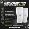 Witte Proform scheenbeschermer sleeves met honingraatpadding en P-logo. Wasinstructies getoond.
