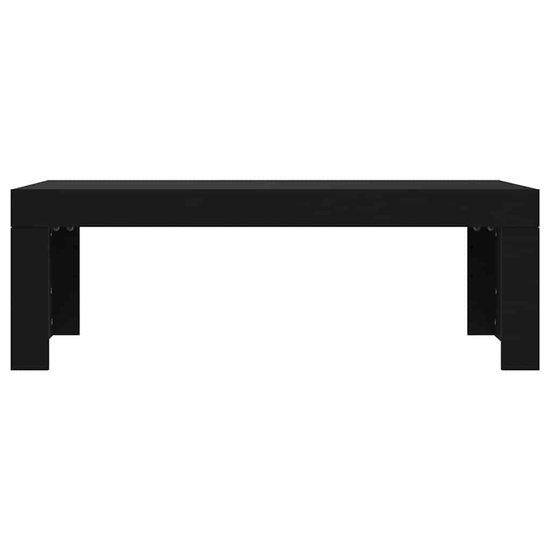 Zwarte salontafel van bewerkt hout, 102x50x36 cm.