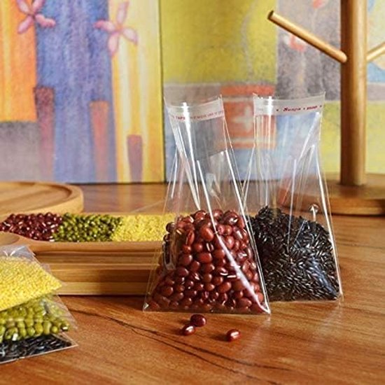 150 Stuks Cellofaanzakken Helder Zelfklevend. OPP Plastic Zakken met Naadafdichting, zonder Ventilatiegat voor Snoep, Geschenken, Sieraden, Kaarten, Snoep, Chocolaatjes, Foto's. — afbeelding 4