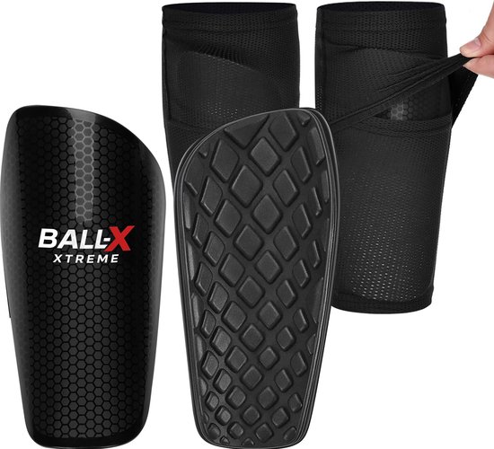 Zwarte BALL-X Xtreme scheenbeschermers met honingraatmotief, inclusief bijpassende mesh compressiekousen.