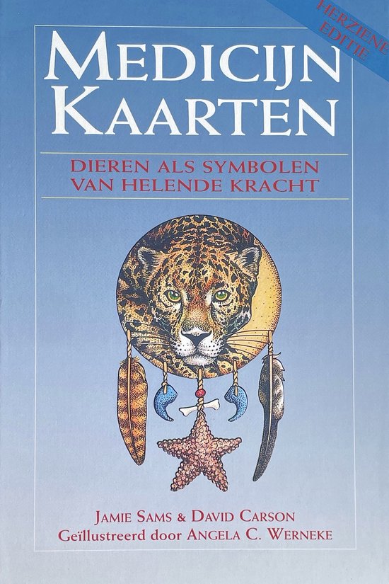 Boek 'Medicijnkaarten Dieren als symbolen van helende kracht' met jaguarhoofd en dromenvanger.