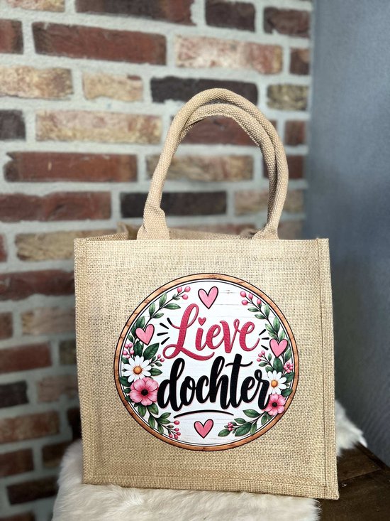 Juten tas met de tekst Lieve dochter in een bloemenkrans met roze hartjes.