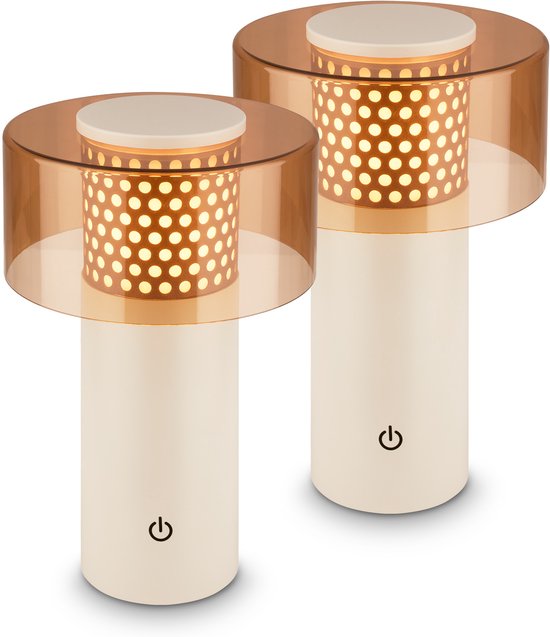 Twee crème draadloze tafellampen met amberkleurig scherm en perforaties, met aan/uit-symbool.