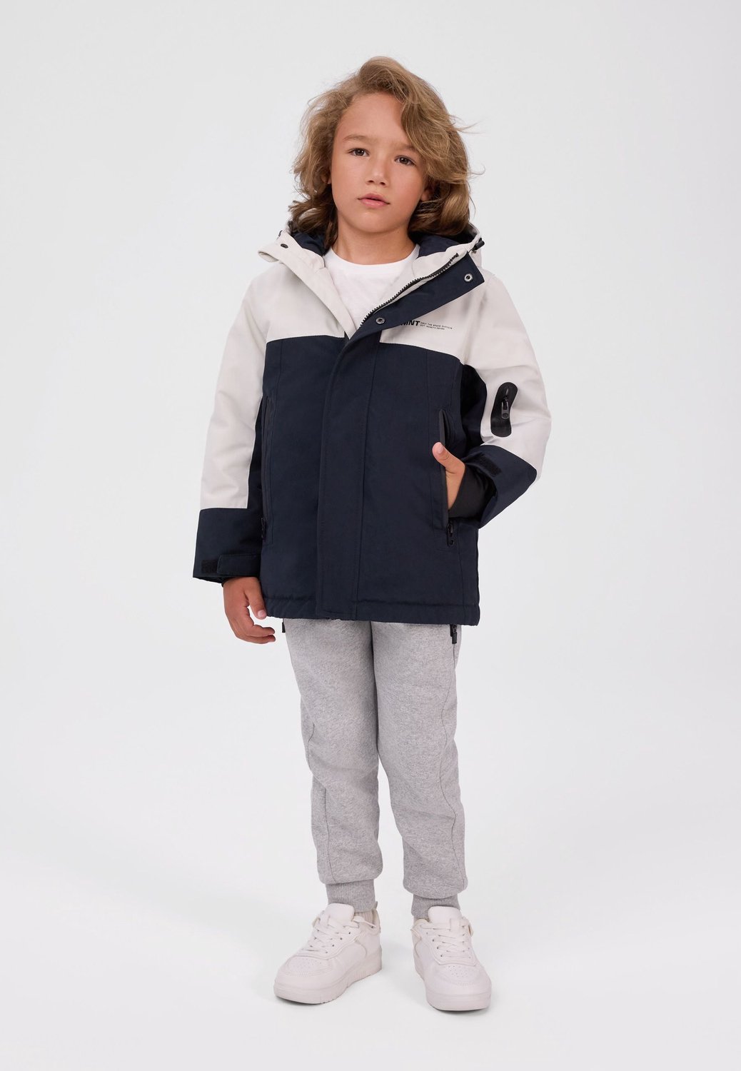 Minoti winterjas jongens – parka met duimgaten – kleurblokken – crème-zwart