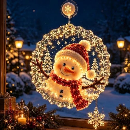Verlichte raamdecoratie met een sneeuwpop in een rode muts en sjaal, omringd door een frame met sneeuwvlokmotief.