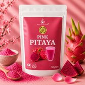 Verpakking 'Pink Pitaya' met pitaya fruit, gesneden pitaya, roze poeder, bloesemtak en een glas met roze drank. Tekst op verpakking: 'Pink Pitaya'.
