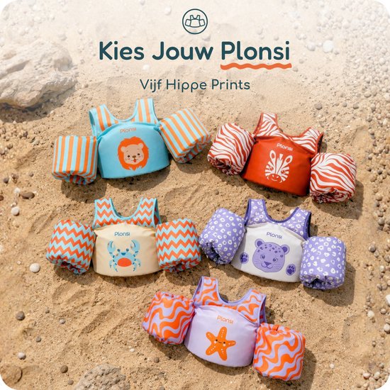 Vijf zwemvesten met bijpassende zwemvleugels op een zanderige ondergrond. Vesten met prints van leeuw, olifant, panter, vis en strepen.