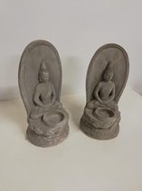Boeddha beelden met waxine lichthouder. Set van 2.