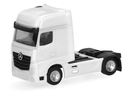 Wit schaalmodel van een Mercedes-Benz Actros Giga vrachtwagen met een zwarte grille en het Mercedes-Benz logo.