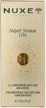 Gouden Nuxe Super Serum verpakking met reliëf textuur en merklogo.