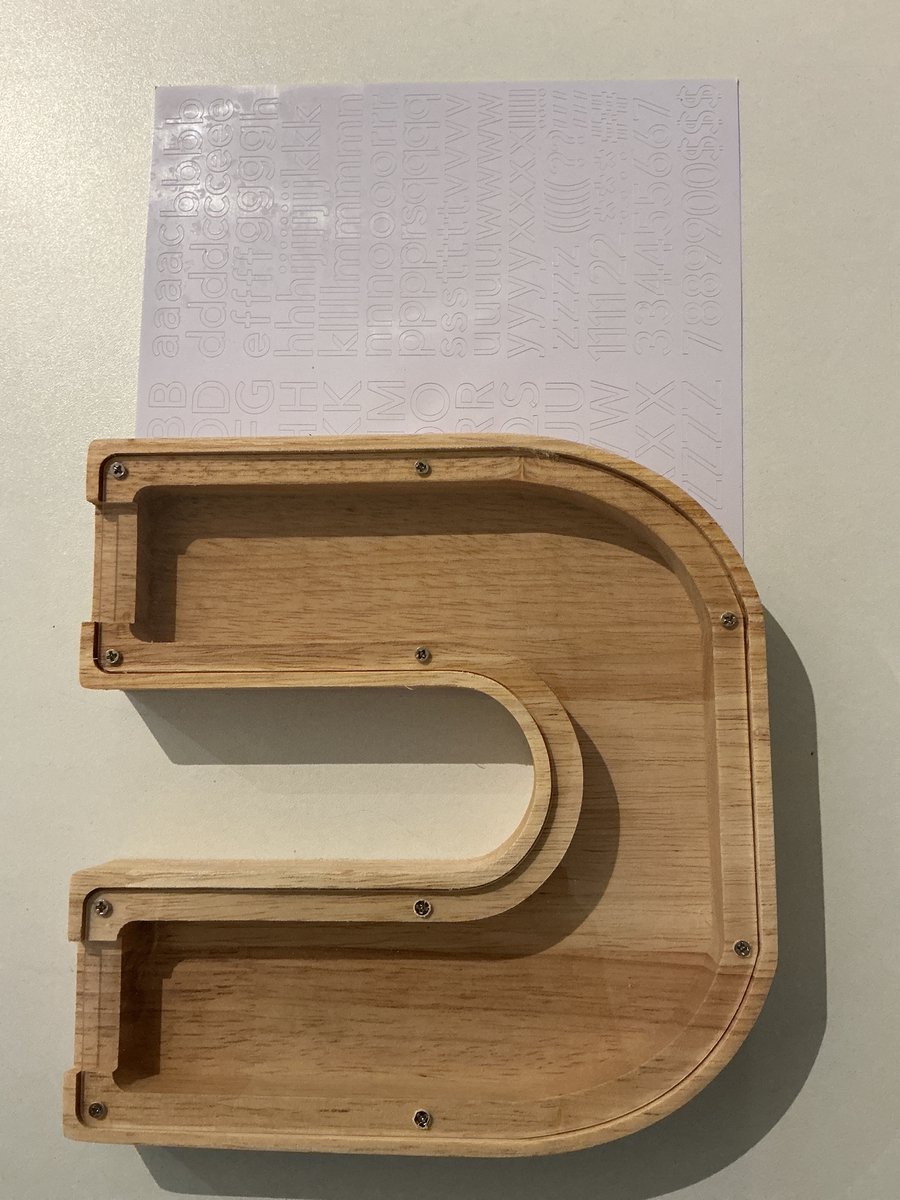 SPAARPOT HOUT LETTER U