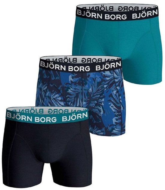 Drie Björn Borg boxershorts: turquoise, blauw met bladerprint en zwart. Allen met logo band.