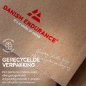 Bruine kartonnen verpakking met 'Danish Endurance' logo en de tekst 'Goodbye plastic bags, Hello recycled packaging'.
