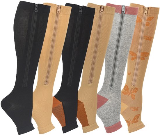 Zes kniehoge compressiekousen met rits: zwart, beige, zwart, beige, grijs en beige met vlinderprint.