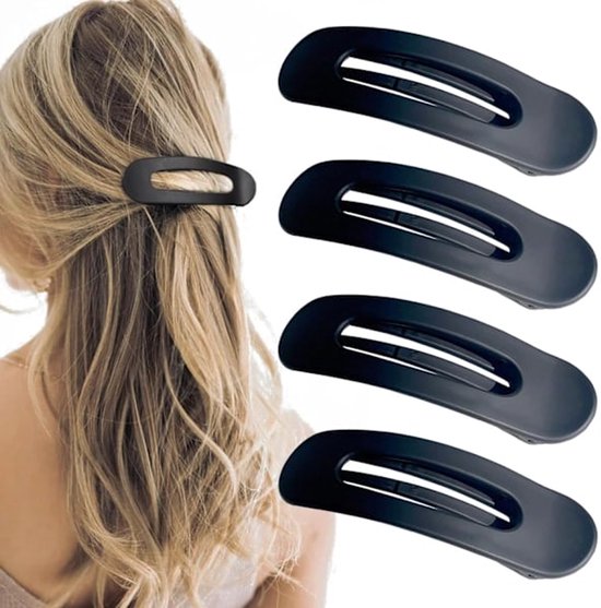 Vier zwarte matte haarclips in ovale vorm, op een blonde vrouw met lang haar.