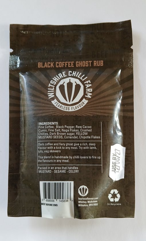 Zwarte verpakking met 'BLACK COFFEE GHOST RUB' opdruk, ingrediëntenlijst zichtbaar.