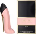 Roze pumpvormige parfumfles naast de verpakking 'Good Girl Carolina Herrera Blush'.