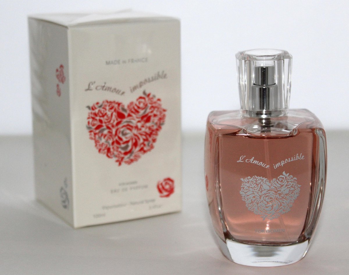 Goedkoopste Franse - L' Amour Impossible - een heerlijke bloemige parfum - met Witte Ceder en Muskus en Ceder - met gratis handtasvestuiver.