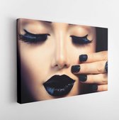 Beauty Fashion Model Girl with Black Make up, Long Lushes. Fashion Trendy Caviar Black Manicure. Nail Art. Dark Lipstick and Nail Polish. Isolated over black background - Modern Ar