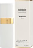 Witte Coco Mademoiselle Eau de Toilette 50 ml sprayfles naast de verpakking.