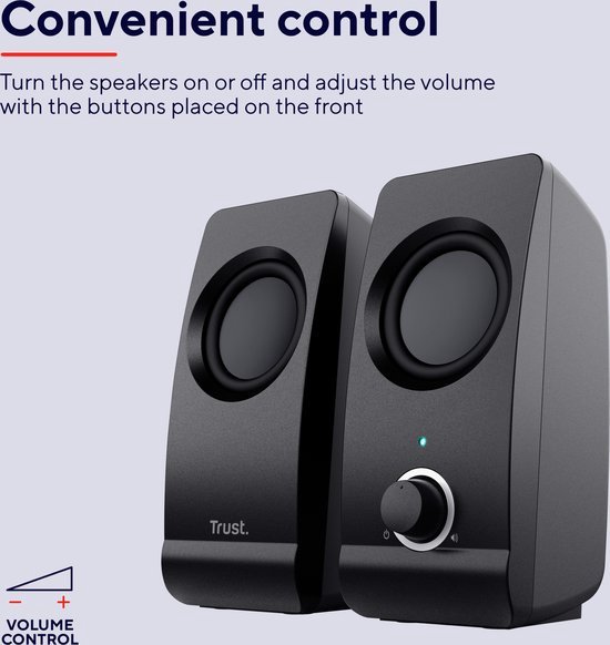 Twee zwarte Trust speakers met ronde speakers en volumeknop aan de voorkant. Gemakkelijke volumeregeling.