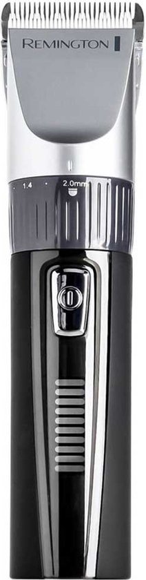 Zwarte Remington tondeuse met zilverkleurige kop, aan/uit-knop en batterij-indicator.