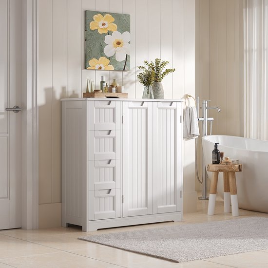 Witte badkamerkast met 4 laden en 2 deuren, in een badkamer bij een badkuip, met schilderij aan de muur.